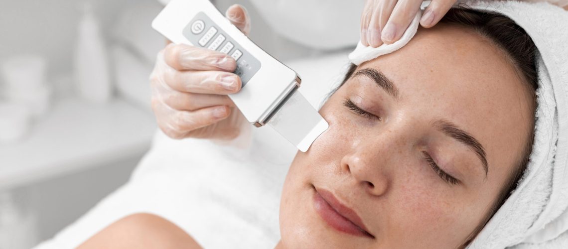 beautician-doing-face-beauty-routine-female-client (1)